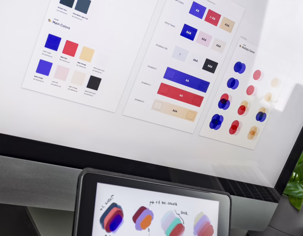 Monitor and iPad showing brand styles.